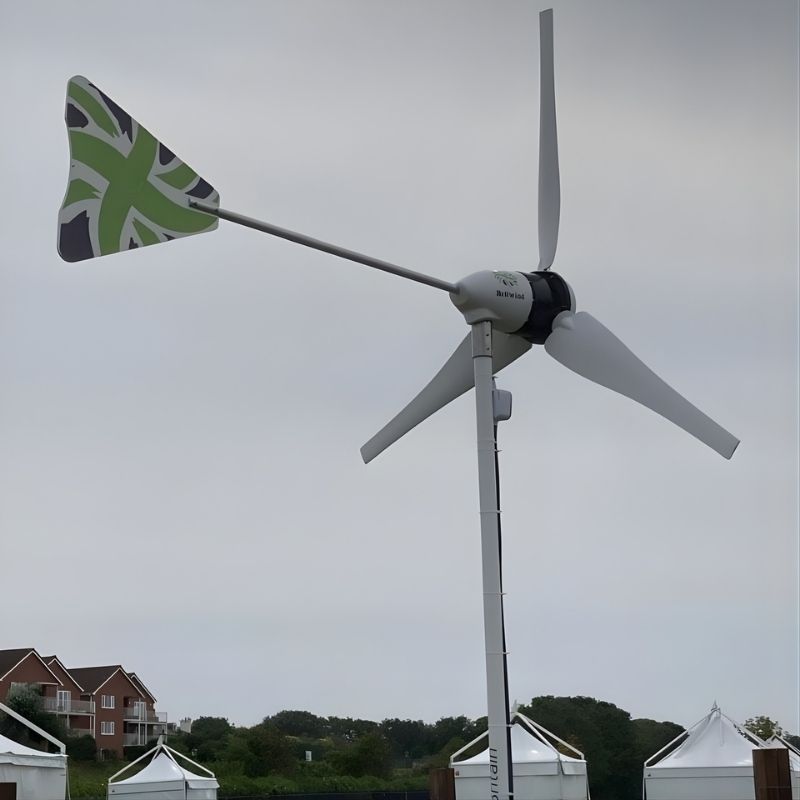 BRITWIND H1 1kW Horizontal Axis Land-Based Wind Turbine - side view outdoor setting cloudy sky