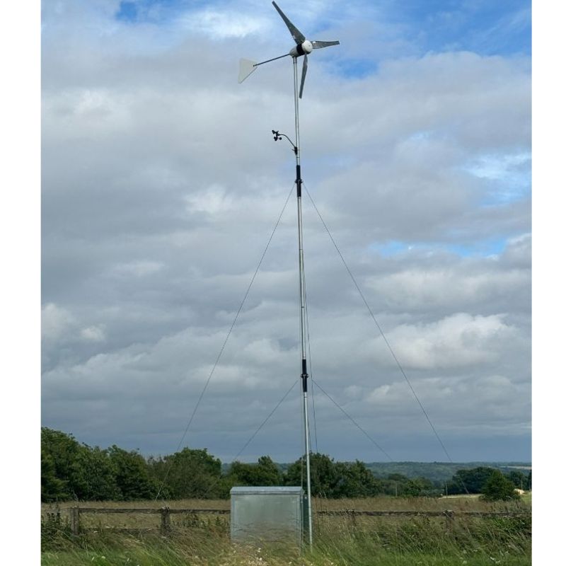 BRITWIND H1 1kW Horizontal Axis Land-Based Wind Turbine - outdoor setting in grass field