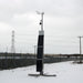 Marlec Rutland 1200x Land-Based Wind Turbine with MPPT Controller 12V on a snowy landscape