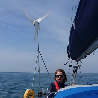 Marlec Rutland 1200x Marine Wind Turbine with MPPT Controller 12V - woman on the boat in open sea