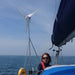 Marlec Rutland 1200x Marine Wind Turbine with MPPT Controller 12V - woman on the boat in open sea